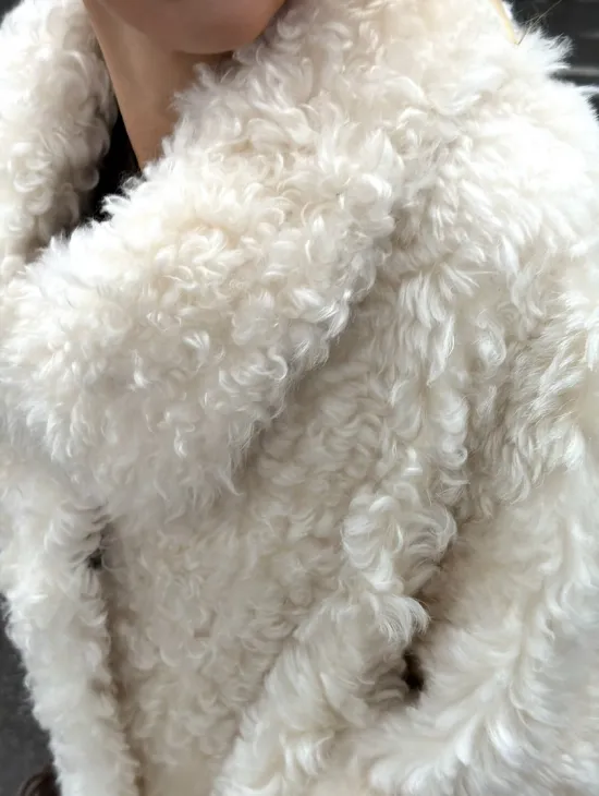 Белая шубка из тиградо - фото 2